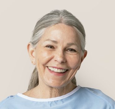 senior-woman-hospital-patient-cured-from-covid-19.jpg